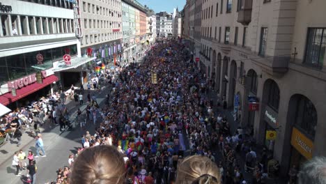 Slow-motion-footage-of-the-Stockholm-Pride-Parade,-seen-from-above-and-behind