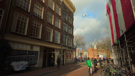 Dolly-in-to-Amsterdam-Nieuwmarkt-square-with-Waag-buidling-from-Antoniesbreestraat