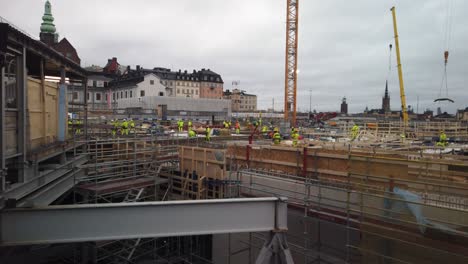 Workers-move-around-at-large-construction-site-at-Slussen-in-Stockholm