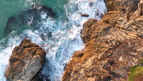 Top-down-ascending-shot-of-Stradbroke-Islands-Rocky-Coast-Line