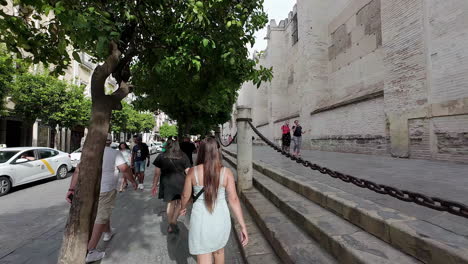 Walking-with-friends-in-historical-streets,-first-person-slow-motion