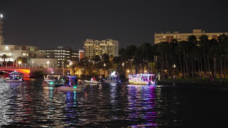 Boats-Adorned-With-Lights-During-Lighted-Boat-Parade-In-Tampa,-Florida-USA