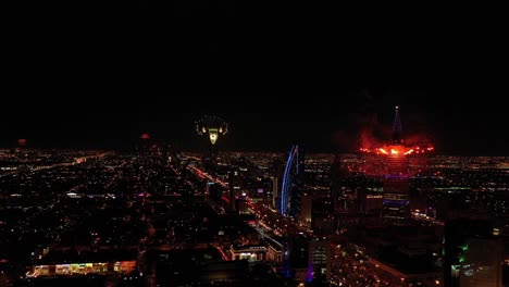 Aerial-shot-of-fireworks-from-Al-Faisaliyah-Tower-and-other-towers