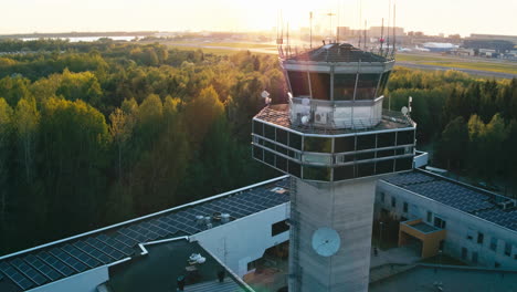 Aerial-view-of-Tallinn-airport-control-tower-in-early-sunset