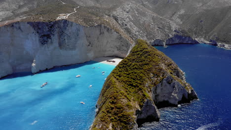 Aerial:-Navagio-beach-with-the-famous-wrecked-ship-in-Zakynthos,-Greece