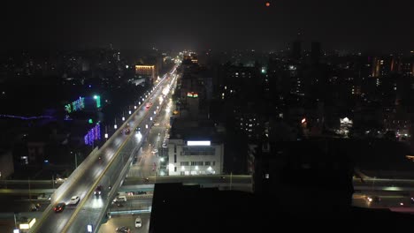 rajkot-aerial-drone-view-dhol-camera-coming-towards-back-bike-and-fourwheeler-going-and-many-fourewheel-coming