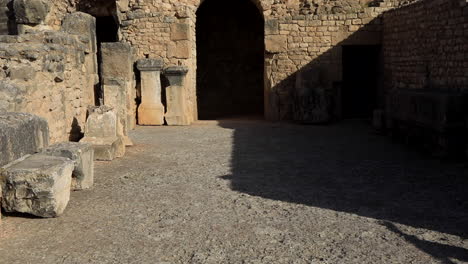 Golden-sunlight-casting-shadows-on-ancient-Roman-ruins-at-Sbeitla