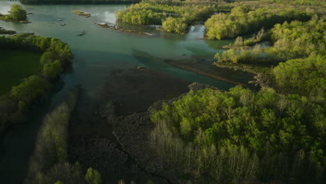 Lake-sequoyah-with-lush-greenery-in-arkansas,-gentle-sunlight,-aerial-view