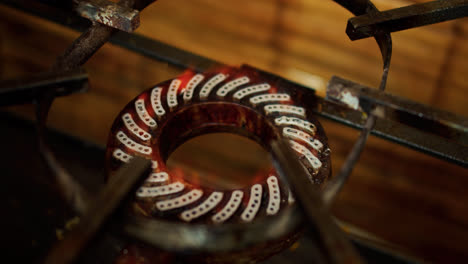 Amazing-slow-motion-detail-shot-of-a-kitchen-stove-as-the-fire-is-lit-for-cooking