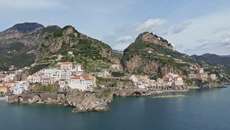 Atrani-village-and-Castiglione-beach-on-Amalfi-Coast,-Italy,-with-clear-blue-sea