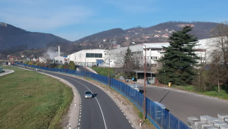 Road-Car-Traffic-by-Metallurgic-Factory-in-Sevojno-Small-Town-in-Western-Serbia