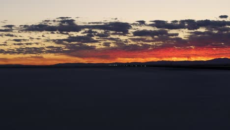 Aerial-view-of-Salt-Flats-landscape-at-sunset,-Bonneville-in-Utah