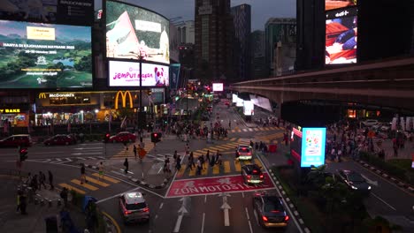 Bukit-Bintang-Crossing-at-night-in-Kuala-Lumpur-city,-Malaysia