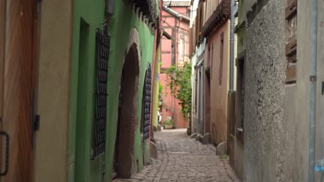 People-Pass-the-Alley-in-Riquewihr-Village