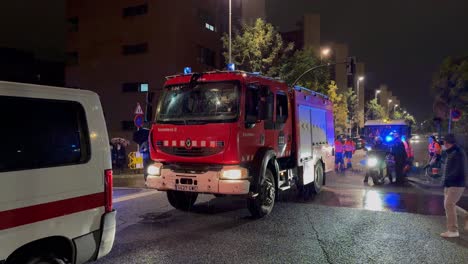 Fire-truck-stopped-with-emergency-lights-on-the-streets-of-Barcelona