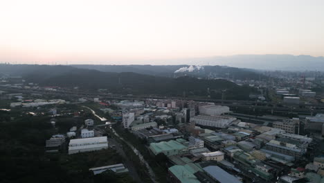 Pullback-Drone-View,-Luzhu-District-Taoyuan-Taiwan,-Industrial-Area