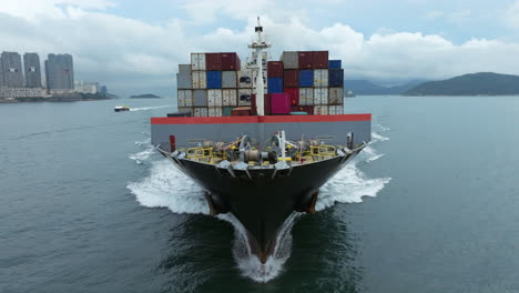 descent-todwards-the-bow-of-a-large-container-ship---close-up-approaching-shot