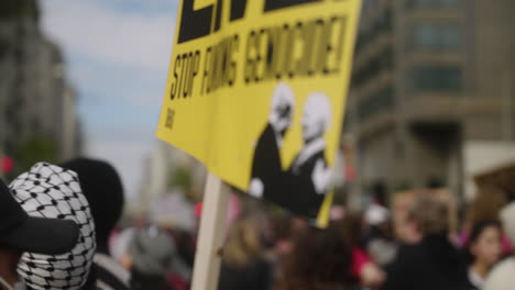 A-Sign-Featuring-Joe-Biden-Shaking-Netanyahu's-Hand-at-a-Pro-Palestine-Protest