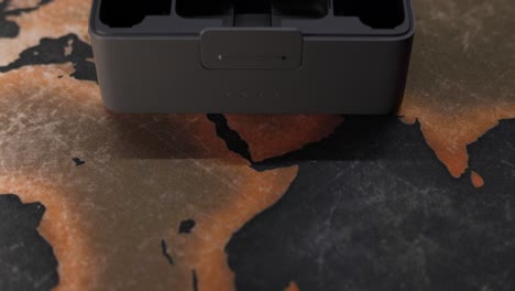 Close-Up-Shot-Of-Wireless-Microphones-Being-Placed-Into-Charging-Case