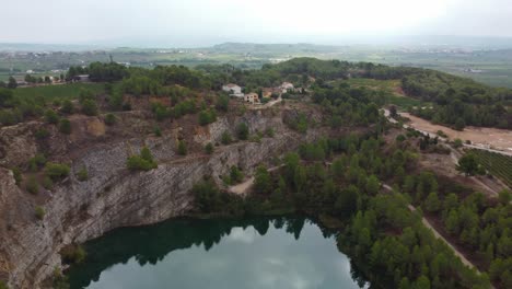 Aerial-view-reveals-Pelag-Gran-and-old-gypsum-mine,-Vilobi-del-Penedes