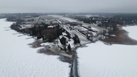 Elk-Mazury-nordic-European-village-surrounded-by-frozen-lake