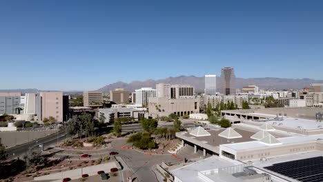 Downtown-Tucson,-Arizona-with-drone-video-moving-up-from-parking-lot