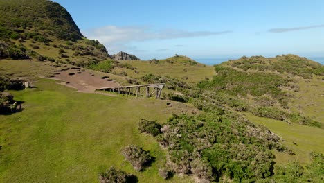 Bird's-eye-view-of-Muelle-de-Las-Almas-solitary-at-dawn,-Cucao-heritage-site,-Chiloe-Chile