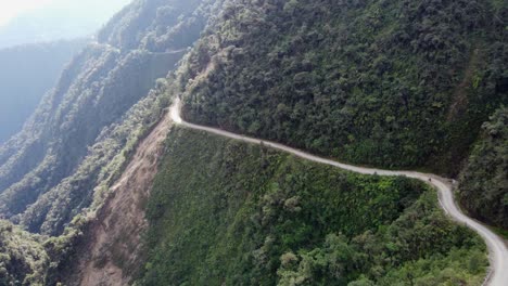 Stunning-nature-aerial:-Cyclist-on-famous-Death-Road-in-Bolivian-Andes