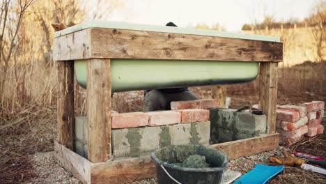 The-Man-is-Stacking-Bricks-Beneath-the-DIY-Hot-Tub---Timelapse