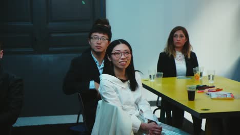 Diverse-group-of-people-with-different-mixed-races-sitting-in-conference-room