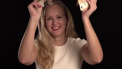 European-blonde-girl-being-extremely-happy-about-her-money