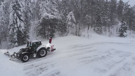 Tractor-Ploughing-In-Deep-Snow-During-Snowstorm