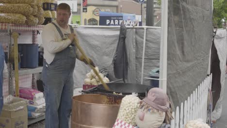 Hoopfest-2018---streetside-vendor-cooking-kettle-corn