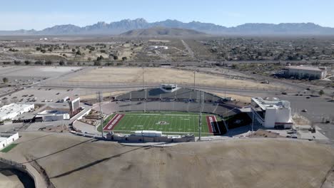 Aggie-Memorial-stadium-on-the-campus-of-New-Mexico-State-University-in-Las-Cruces,-New-Mexico-with-drone-video-moving-in