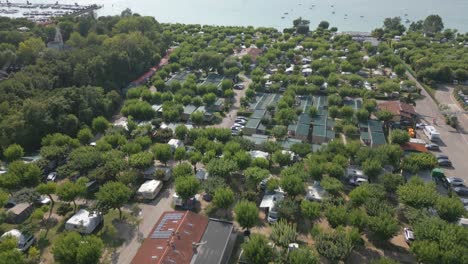 Aerial-Shot-of-Camping-Belvedere-Campground-and-Swimming-Pool-at-Lake-Garda,-Italy