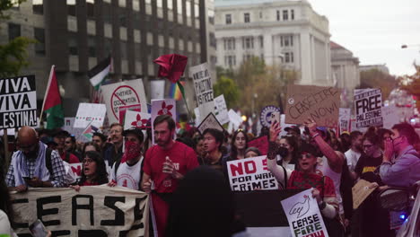 A-Slow-Motion-Shot-of-a-Large-Crowd-of-Pro-Palestine-Protestors-Marching-in-the-Streets