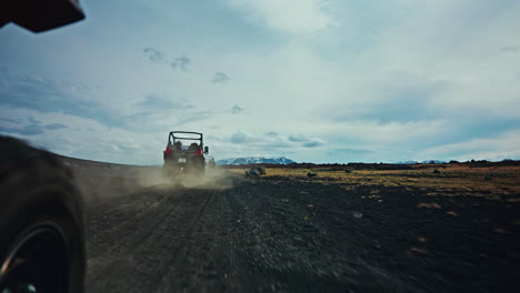 Wheel-POV-of-a-buggy-driving-off-road-into-rugged-terrain