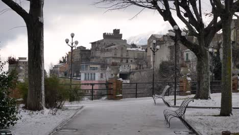 View-of-Guardiagrele-through-the-s-now-covered-Garden-of-Villa-Comunale,-Abruzzo,-Italy