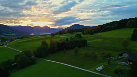 Dramatic-Sunrise-Over-Fields-And-Mountains-In-Autumn