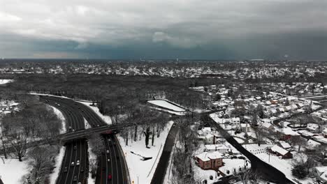 An-aerial-view-of-the-Southern-State-Parkway-on-Long-Island,-NY-on-a-cloudy-winter-day