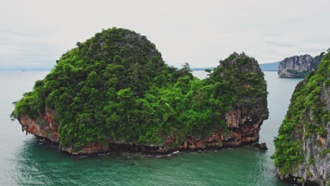 Limestone-Island-Along-the-Coastal-Lands-of-Thailand-in-Railay-from-an-Aerial-Orbital-Drone-Shot