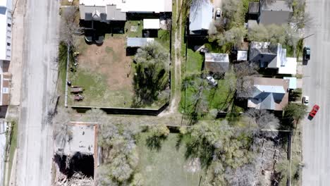 Neighborhood-in-Sweetwater,-Texas-with-drone-video-overhead-and-looking-down