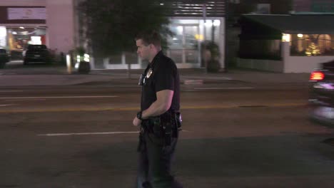 Police-Officer-standing-on-sidewalk