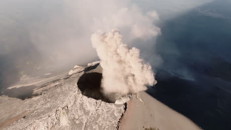 Aerial-view-over-crater-of-Fuego-volcano-in-Guatemala-while-smoke-is-coming-out
