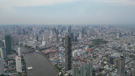 Aerial-of-Bangkok's-iconic-river-and-cityscape
