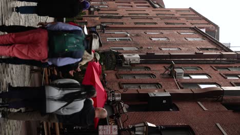 Pedestrians-Strolling-Past-a-Historic-Building-in-Portland,-Maine---Vertical-Shot