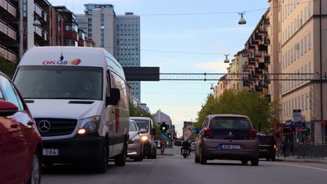 Centered-view-of-street-traffic-on-Gotgatan-in-Stockholm,-Sweden