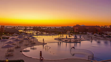 Timelapse-of-a-vibrant-sunrise-at-the-Pickalbatros-Laguna-Vista-Hotel,-in-Sharm-El-Sheikh,-Egypt