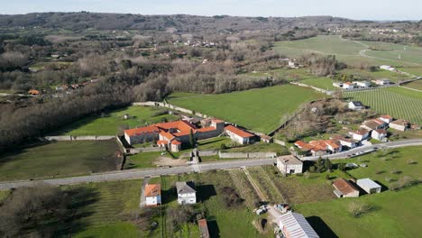 Panoramic-aerial-overview-of-San-Salvador-de-Ferreira-monastery-in-rural-countryside-village