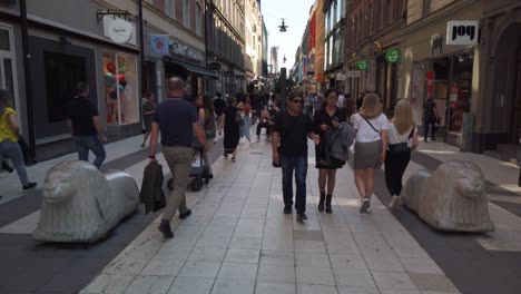 People-walking-on-Drottninggatan-in-Stockholm,-Sweden,-scene-of-the-2017-terrorist-attack